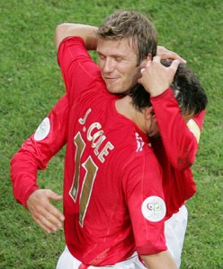 England's Cole celebrates his goal against Sweden with team mate Beckham during their Group B World Cup 2006 soccer match in Cologne